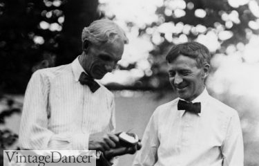 Harvey Firestone (1868-1938) standing with Henry Ford wearing bow ties