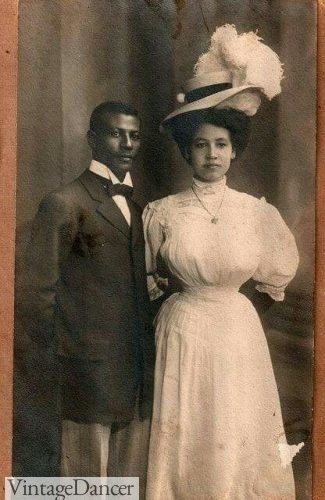 Edwardian era dress A handsome black couple, a white tea dress with short sleeves African American fashion in the Edwardian era