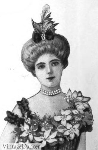 Edwardian hair style for evenings ballgowns 1901 Feather in center