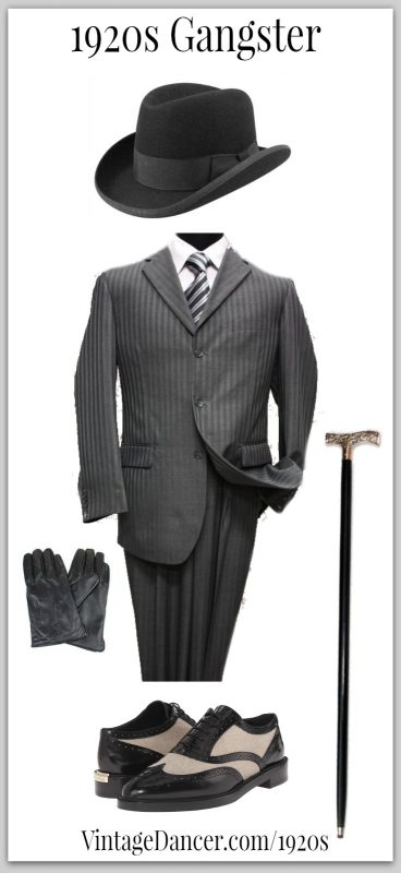 1920s Gangster look - Black homburg hat, dark grey striped suit, two tone shoes, leather gloves and a walking cane (or is it a weapon?) Get these at VintageDancer.com/1920s