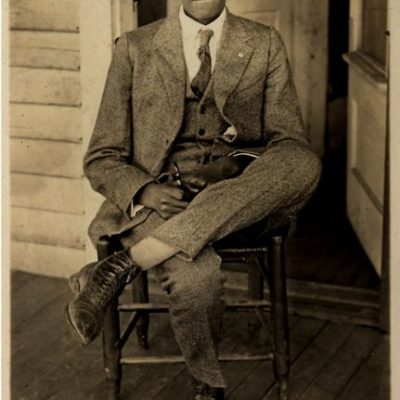 A well dressed 1920s black boy teen in his suit and flat cap African American teenager 1920s