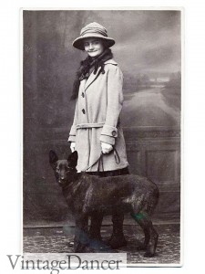 1920s women in coat, flapper with dog