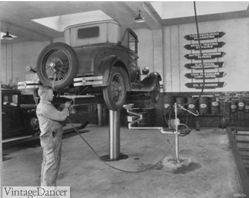 1920s car mechanic wearing coveralls