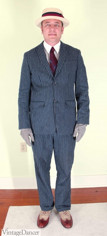 1920s mens gangster costume - Upper-class men's costume or gangster outfit with a striped blue suit, wingtip shoes, boater hat, gloves, white-collar shirt and tie. 