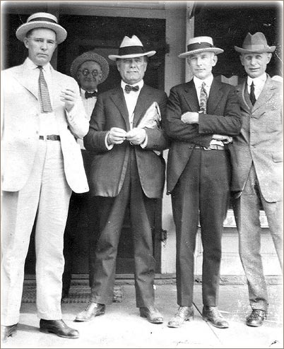 1920s Men in summer suits and straw hats