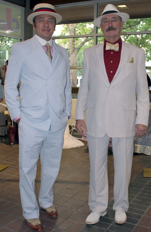 Seersucker suit on the left, ivory linen suit on the right. Both are perfect for hot summer events.