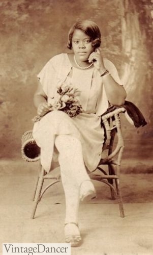 1920s woman in a white dress