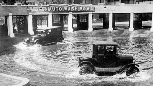 An Auto Wash Bowl - two cars driving through shallow water to clean mud from their undercarriage - at VintageDancer.com