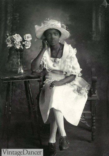 1921 portrait in a white dress and hat