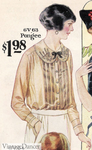 large 1920s peter pan collar on a women's blouse with a bow neatly in the centre. Find more art deco blouse styles at VintageDancer.
