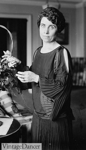 1923 Mrs. Coolidge wears a pleated sleeve and skirt dress