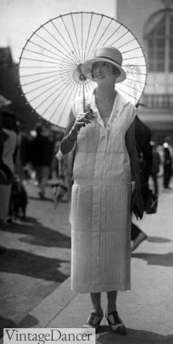 1924 white parasols for a white summer dress