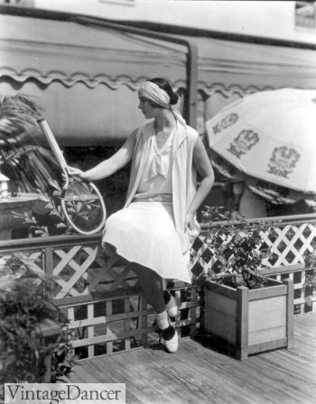 1929, short socks were worn for sporting attire instead of stockings