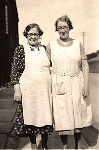 1930s Sisters wearing house dresses and aprons (glasses too.) Plus size womens clothing