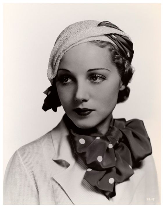 1930s hats styles history women. 1930s mad cap hat and polka dot scarf photo