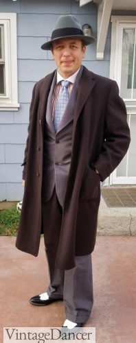 1930s reproduction suit with inspired overcoat, fedora hat and two tone wingtip shoes