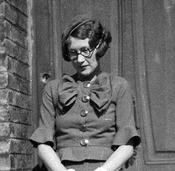 woman wearing 1930s glasses