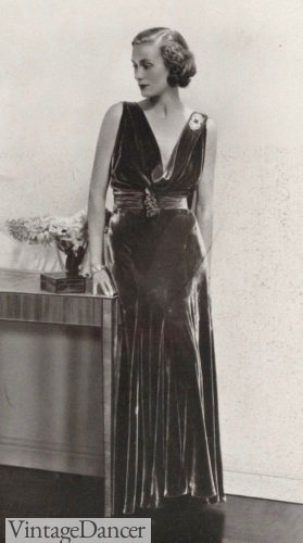 1931 velvet evening dress with paste brooch at the shoulder