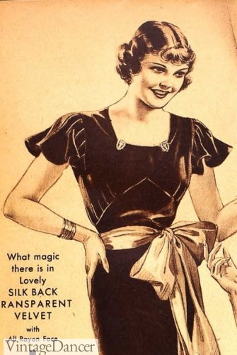 1930s rhinestone dress clips on the neckline and a big bow sash