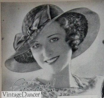 A large picture hat with tight curls on the sides 1930s