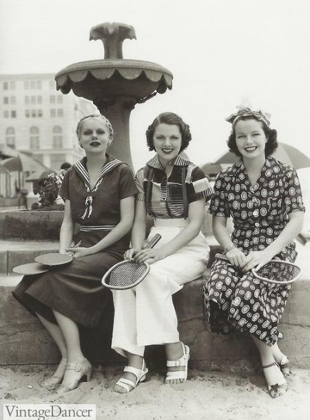1936 Ladies ready to play tennis in coulette, pants and pant set.