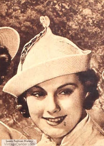 1936 pointed crown hats are iconic to the 1930s