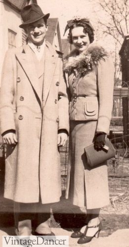 1930s Double breasted overcoat and women in a suit winter