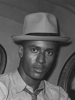 1930s mens hats headwear 1938 fedora with pinch crown and turn up brim worn by a black young man