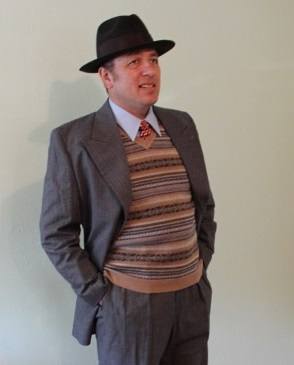 Vintage style men: Layered sweater vest under a suit coat is very classic