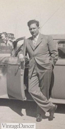 A man and his car (and a nice suit!) early 1940s