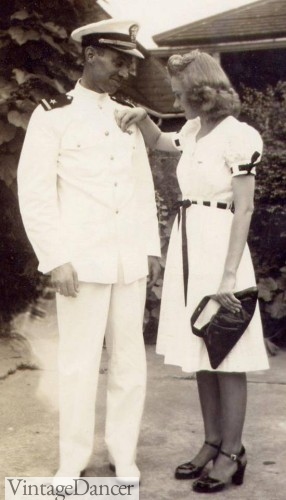 1940s, I love that her outfit matches her Captain husband. 