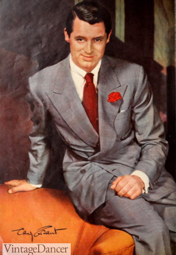 1940s mens fashion history - Cary Grant 1940s grey suit with red boutonniere and red tie photo in color mens fashion 1941
