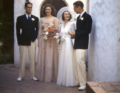 1941, groomsmen wearing ivory and black dinner jackets