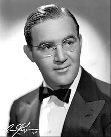1942 Benny Goodman wears thin metal almost round glasses