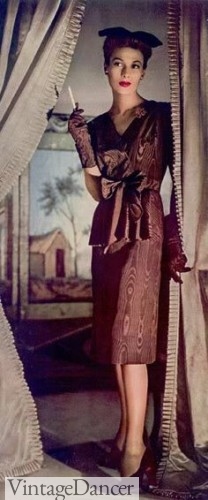 1942 bronze cocktail dress with small hat and long gloves. 