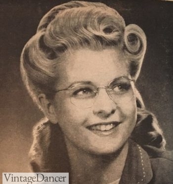 1940s half up half down hairstyle with glasses
