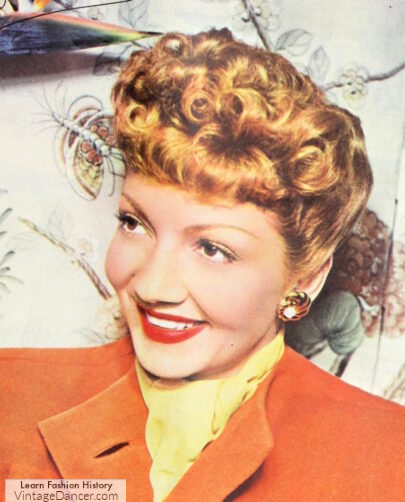 1943 Claudette Colbert poodle top hairstyle 1940s red hair