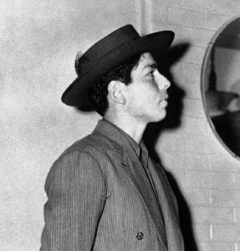 1943 Zoot Suit youth wearing a wide porkpie hat
