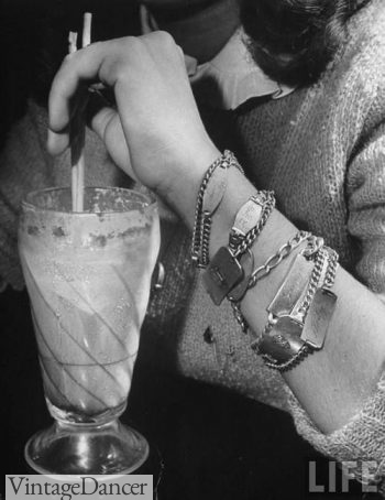 1944, a popular 1940s jewelry trend for teens was to wear one or many charm bracelets or ID bracelets 