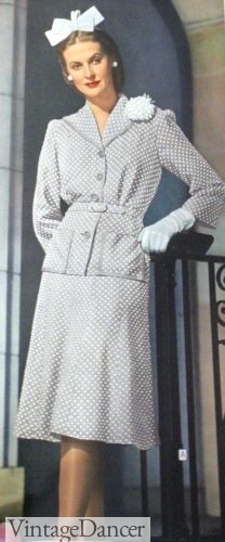 1940s vintage hair accessory: A large hair bow accessorizes this outfit from 1944 perfectly.