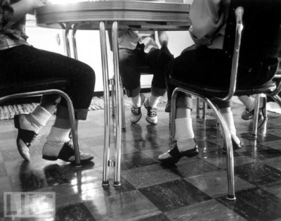 Teens wearing saddle shoes and bobby socks in 1949.