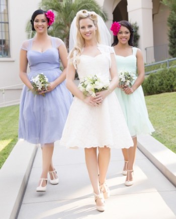 Vintage inspired wedding dress and bridesmaid dresses in similar styles. 