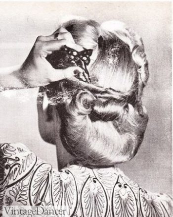 1950s long hair - A flared chignon with butterfly hair pin