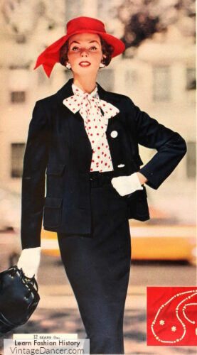 1950s black suits with polka dot bow blouse and red hat