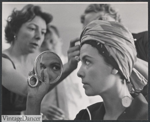 Lena Horne getting ready in a Turban hat 1960s