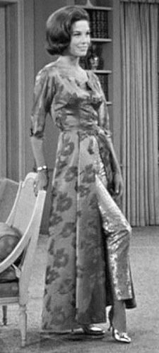 1960 Mary Tayler Moore wears a hostess outfit with pants and dress overskirt