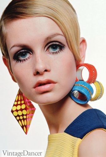 Fashion model Twiggy wearing a selection of plastic jewelry designs in 1967.
