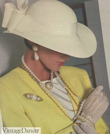 1980s Sophisticated fashion with a hat , gloves and jewelry