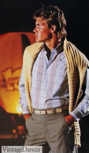 1986 wearing a sweater over the shoulders- very preppy!