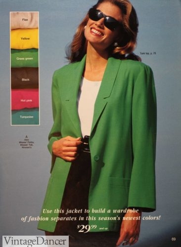 1993 green blazer over white shirt and black belted pants. Oh and fab sunglasses.